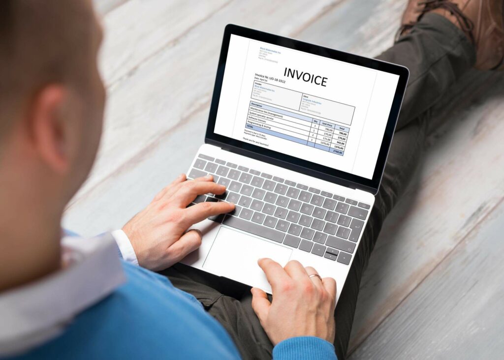 Man looking at an invoice